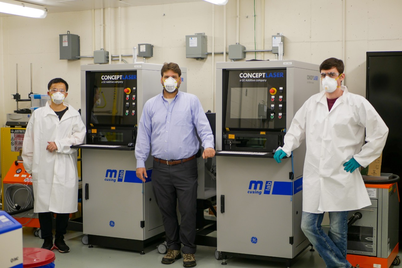 Lab director and students