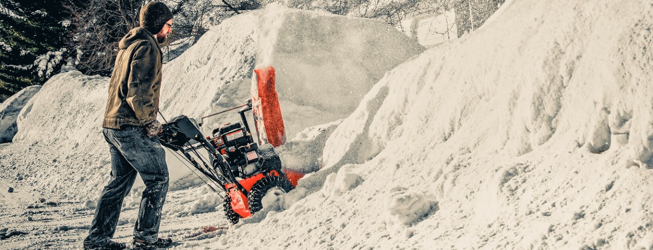 Man using a snow blower