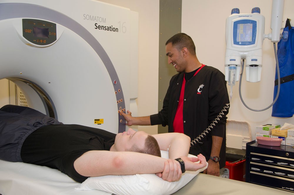 Student working at CT scan at Bethesda North hospital