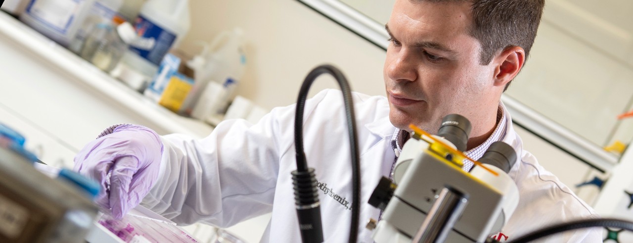 Timothy Phoenix working in the lab