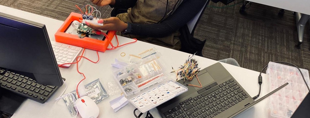 student works on electrical sensors