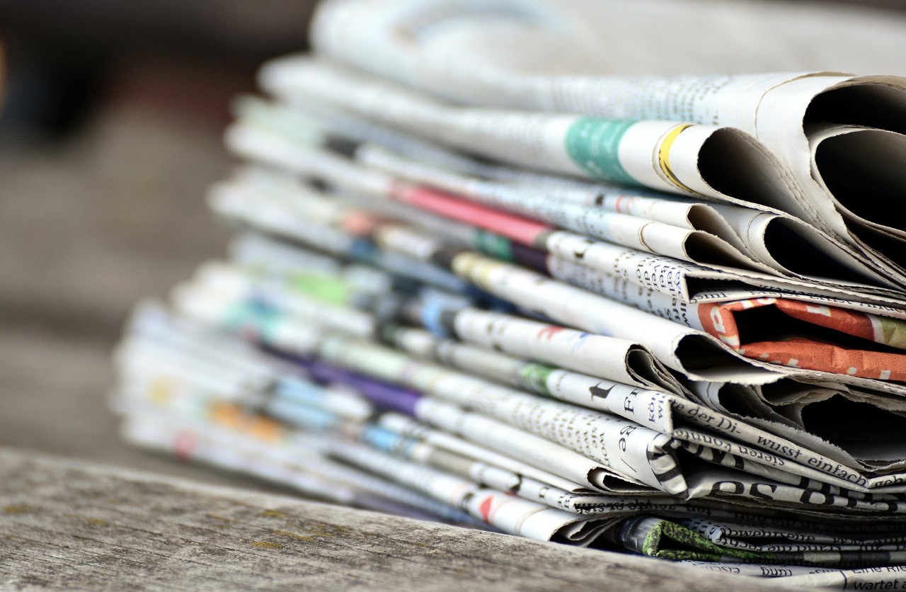 Stack of newspapers.