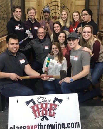 UC AAMN and Cincinnati AAMN chapter members at an axe-throwing event