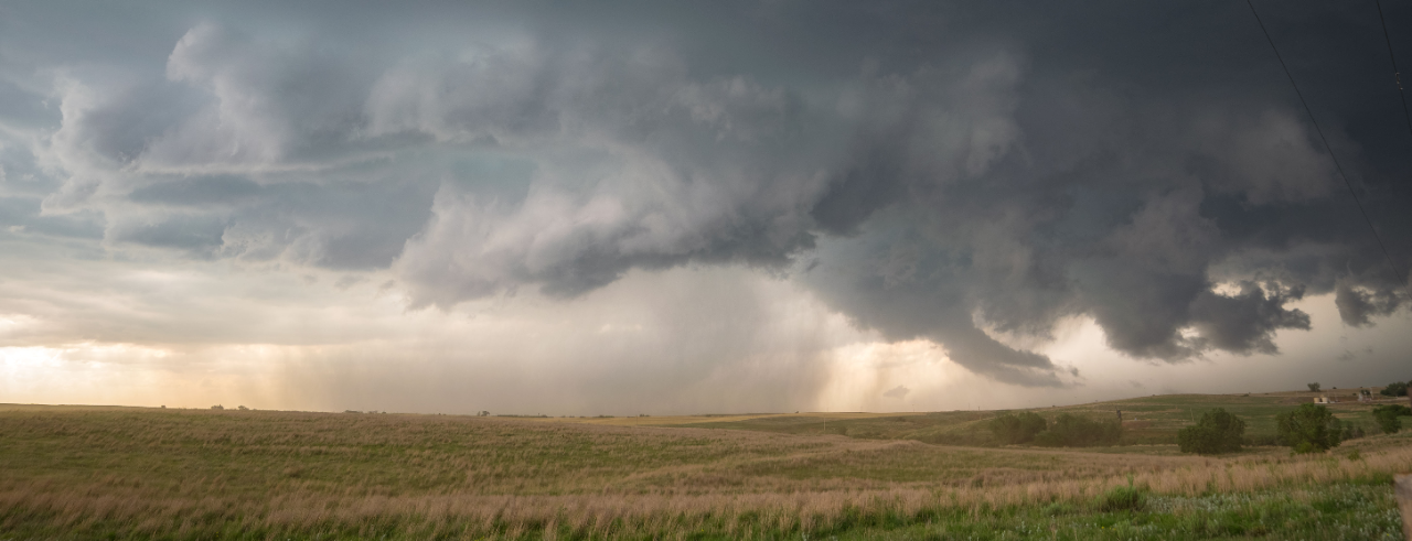 Ominous-looking sky over grassy field