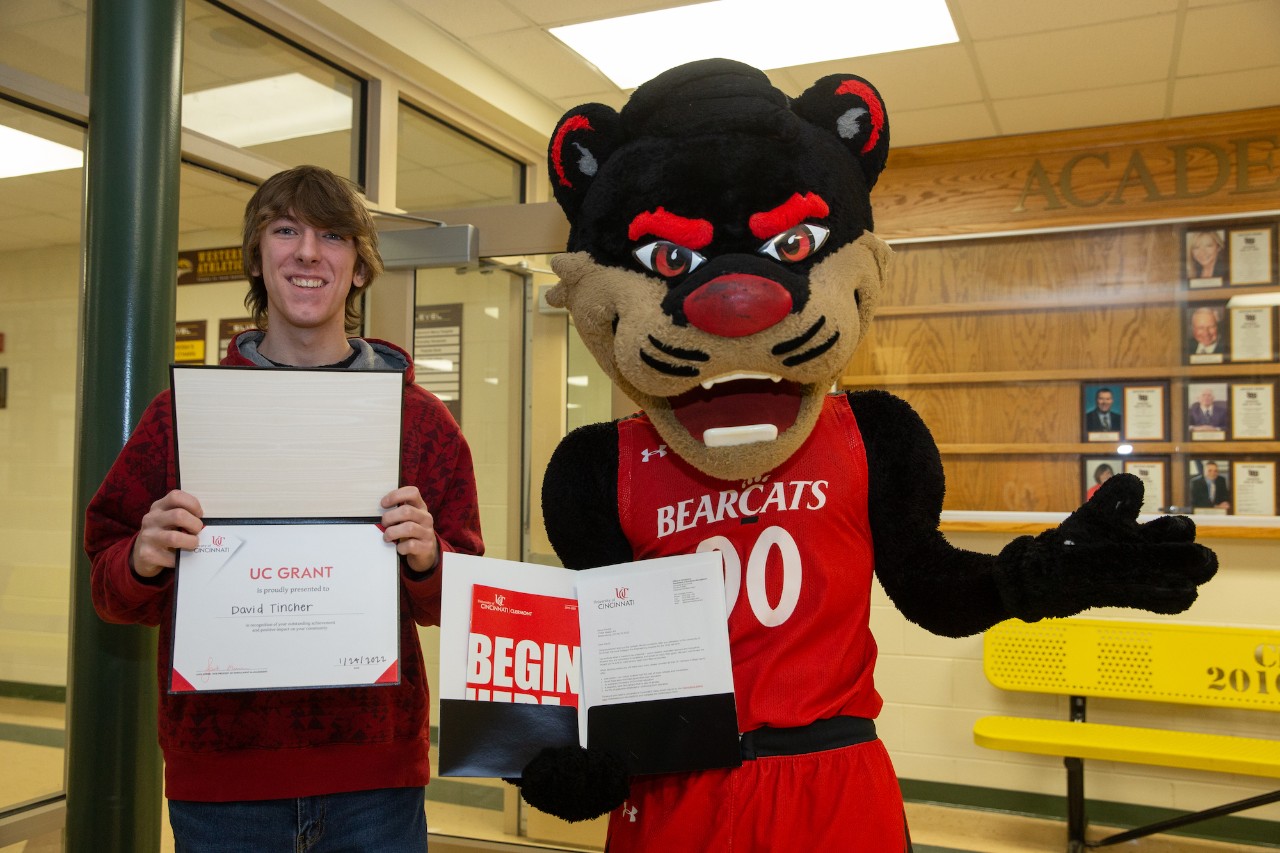 Student smiles with Bearcat