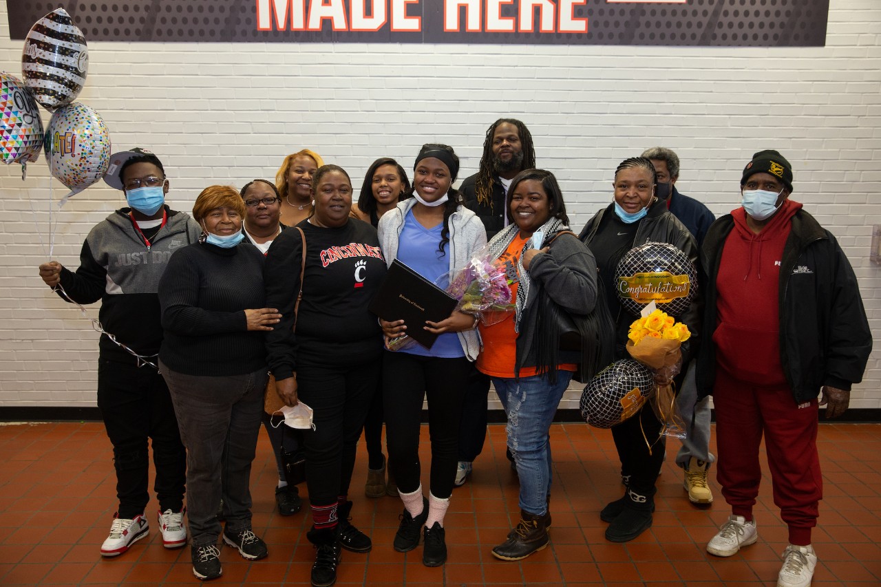 Benya and her family gather for a photo