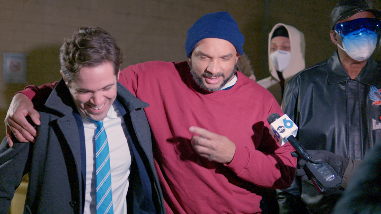 Brian Howe hugged by Richard Horton.