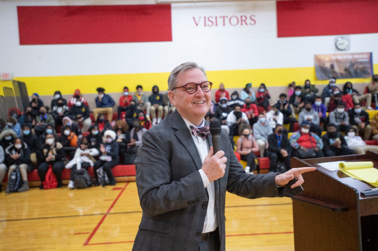 Jack Miner, Vice Provost for Enrollment Management surprised Jalen Tucker future UC Bearcats with Marian Spencer Scholarship awards at Shroder High School Tuesday February 1, 2022. Marian Spencer Scholarship a award students with full tuition, room and board and an all-expenses-paid study abroad experience from the University of Cincinnati. Photos by Joseph Fuqua II