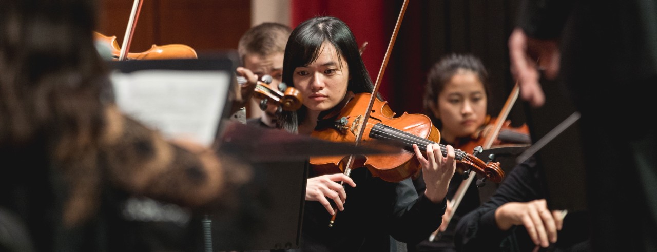 CCM Philharmonia performs on stage