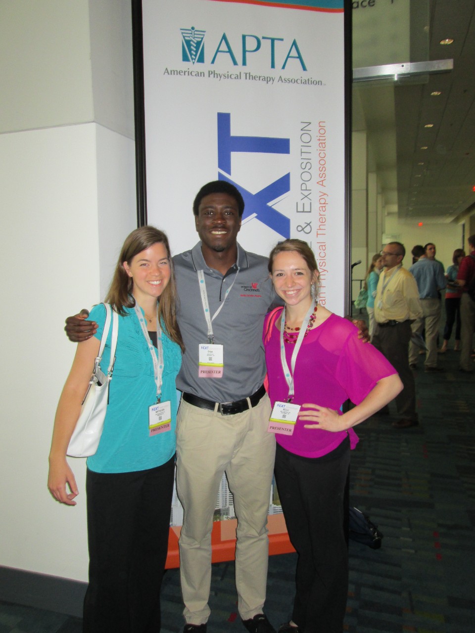 Kelli with two of her classmates at a conference