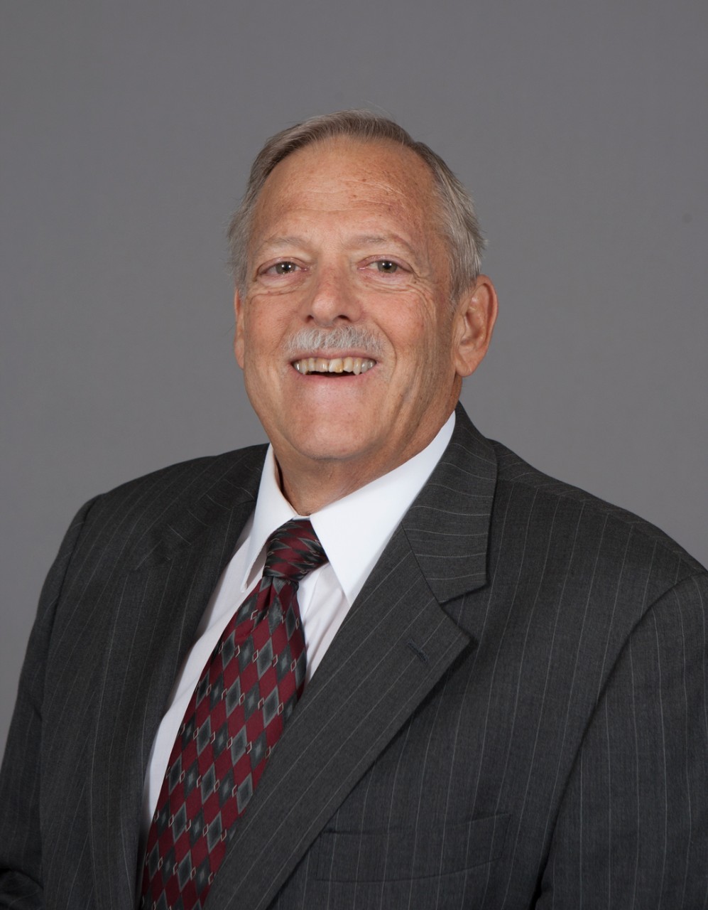 A black and white photo of CCM Assistant Dean Emeritus Paul Hillner