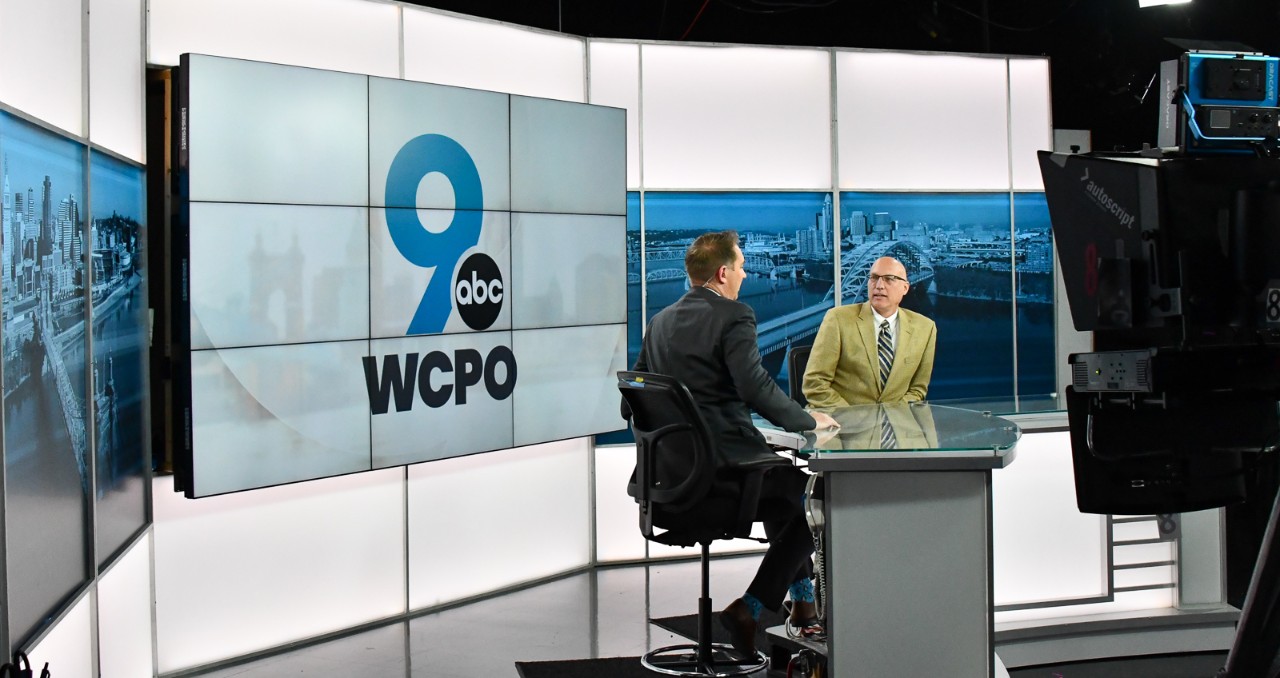 UC engineering dean John Weidner sits for a live interview with anchor Evan Millward in the news studio at WCPO. 