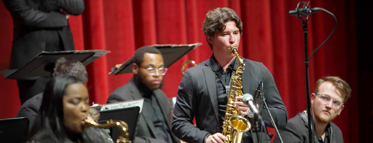 CCM student soloist Colin Palmieri and guest artist Camille Thurman perform with the CCM Jazz Orchestra in a shot from CCM's Spring 2022 Essentially Ellington Concert.