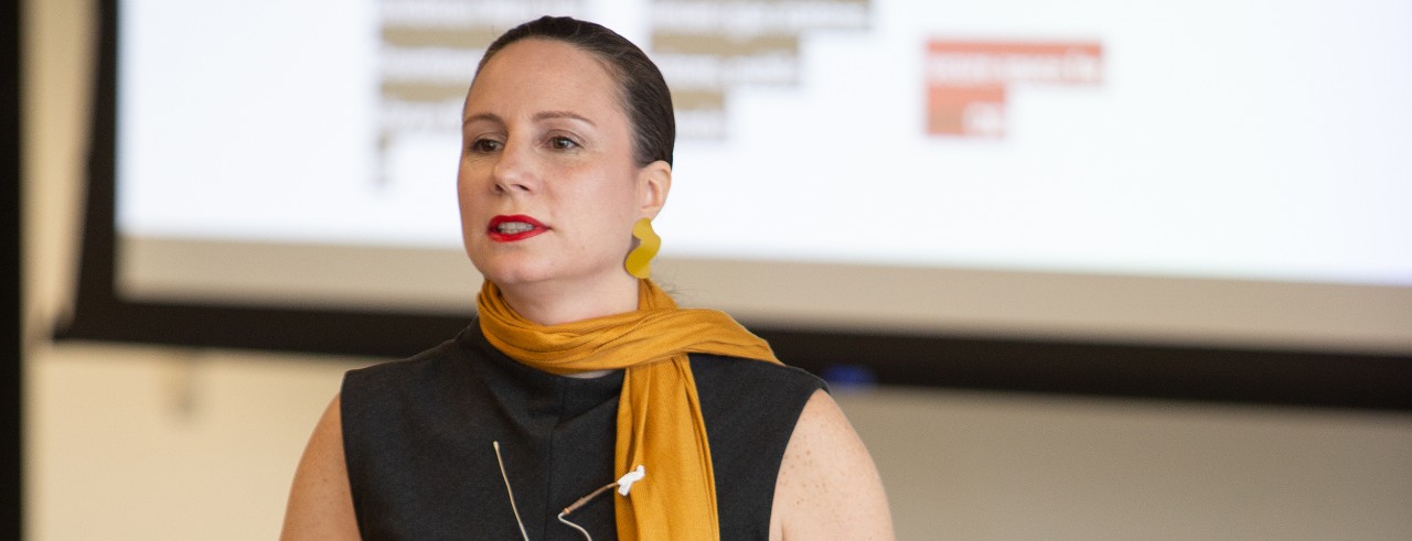 Claudia Rebola presenting at a Venture Lab graduation 