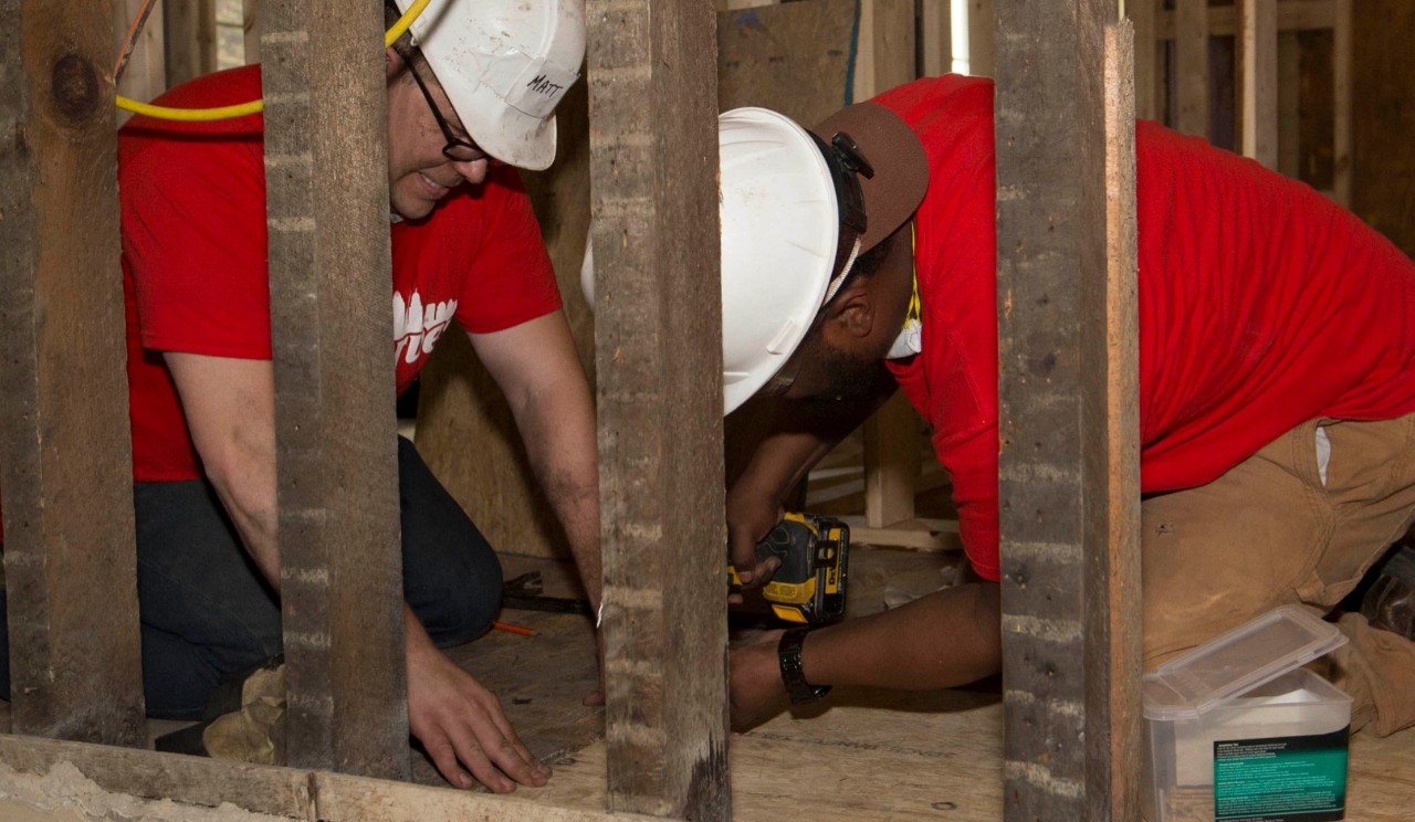 University of Cincinnati faculty and staff members give back to the community through UC Serves 2019 at the Habitat for Humanity Build in Price Hills. UC/Joseph Fuqua II