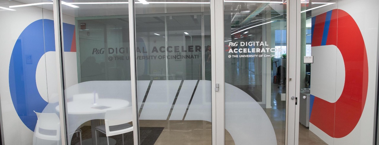 Glass entrance to the P&G Digital Accelerator @ The University of Cincinnati at the 1819 Innovation Hub.