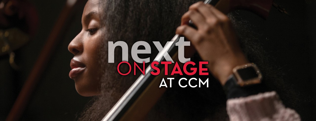 A bass student performs on stage in rehearsal. Photo/Andrew Higley.