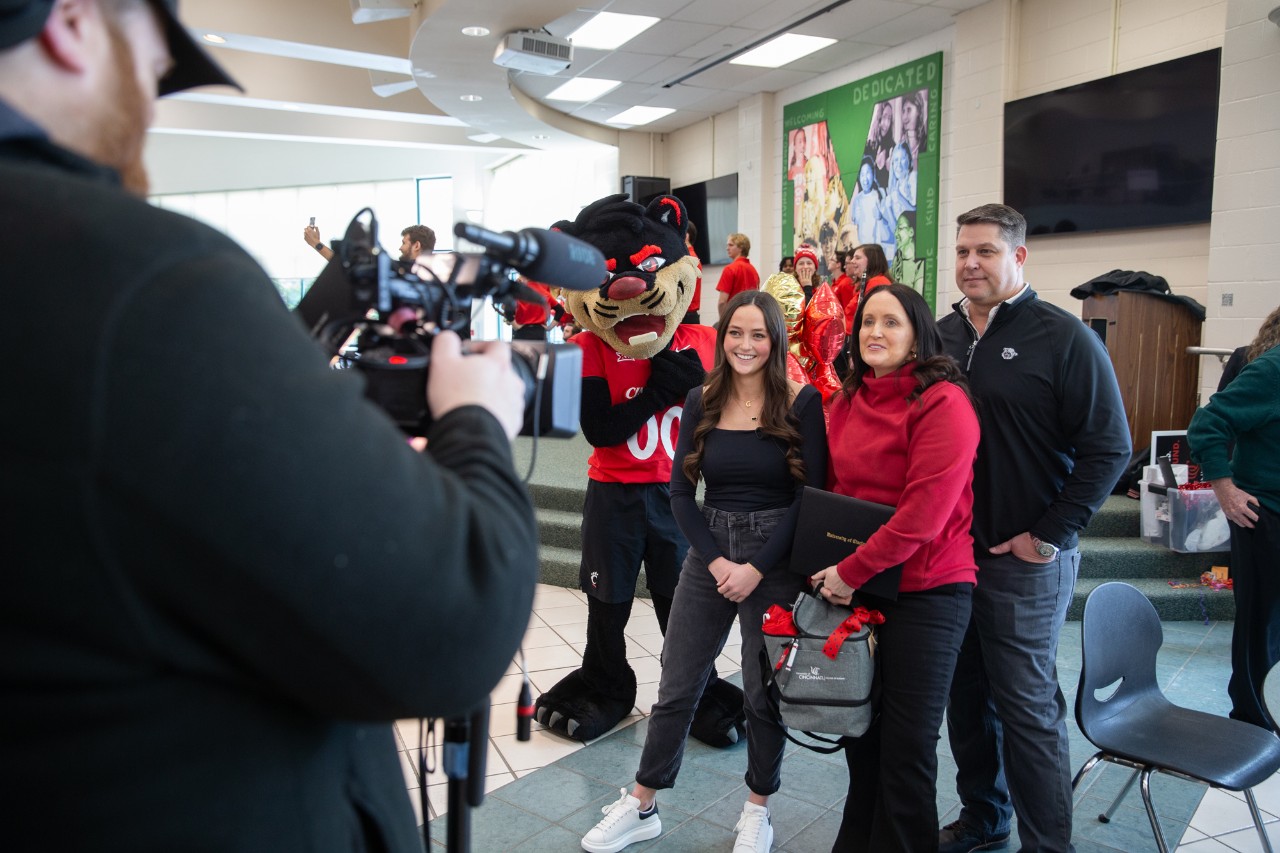 UC surprises Gracie Hicks at William Mason High School on Decision Day.