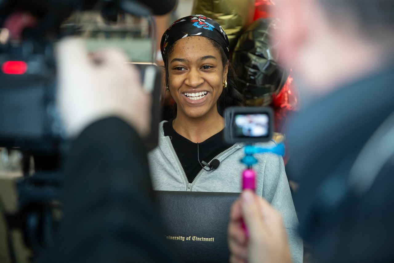 UC surprises Koah Wilson at William Mason High School on Decision Day.