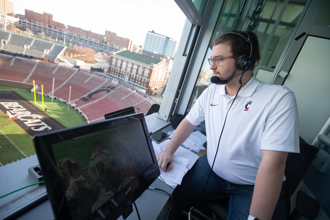 240229aHerzog006.CR2
Ethan Herzog is a CCM Media Production student who does behind the mic work with ESPN+. He is getting top level experience as a student thanks to the opportunities this program has presented him and other CCM students. Here he adds color commentary to a broadcast of a lacrosse match.