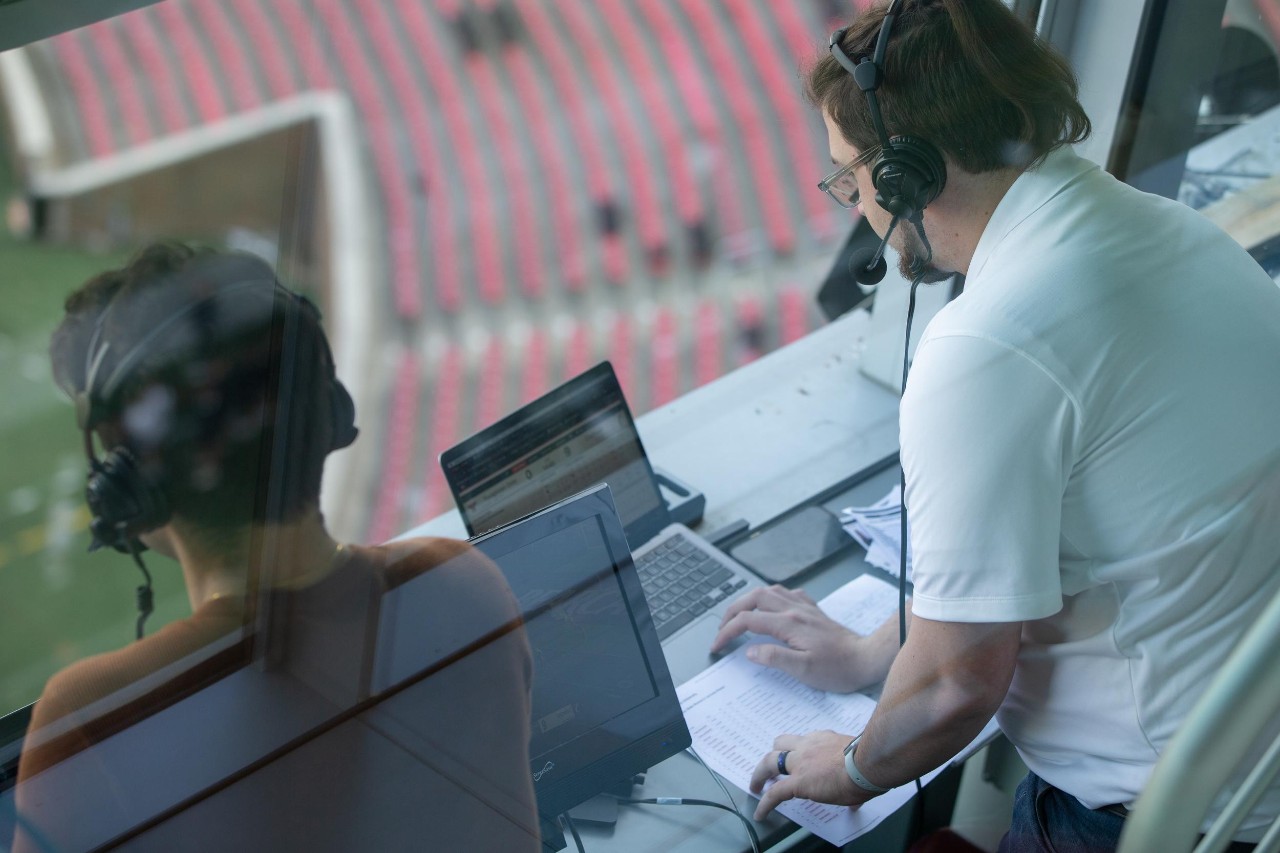 240229aHerzog020.CR2
Ethan Herzog is a CCM Media Production student who does behind the mic work with ESPN+. He is getting top level experience as a student thanks to the opportunities this program has presented him and other CCM students. Here he adds color commentary to a broadcast of a lacrosse match.