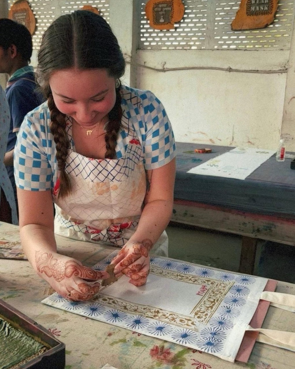 Fashion student Maya Broaddus practicing the artistry of block printing in India.