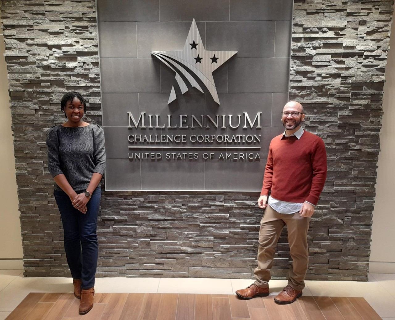 Tolulope Odunola and Patrick Ray at the Millennium Challenge Corporation office