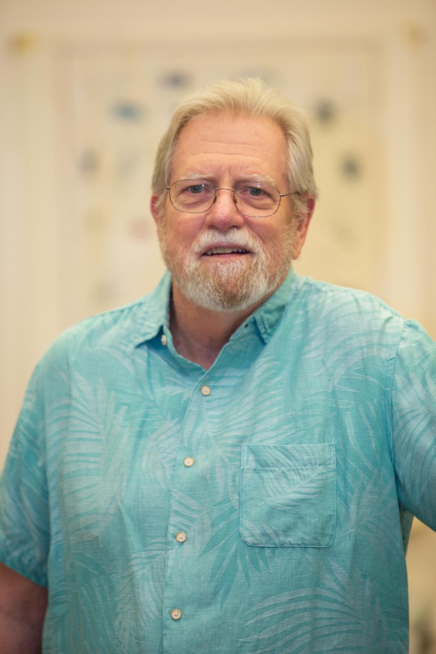 UC biology professor George Uetz works with spiders in his lab. 