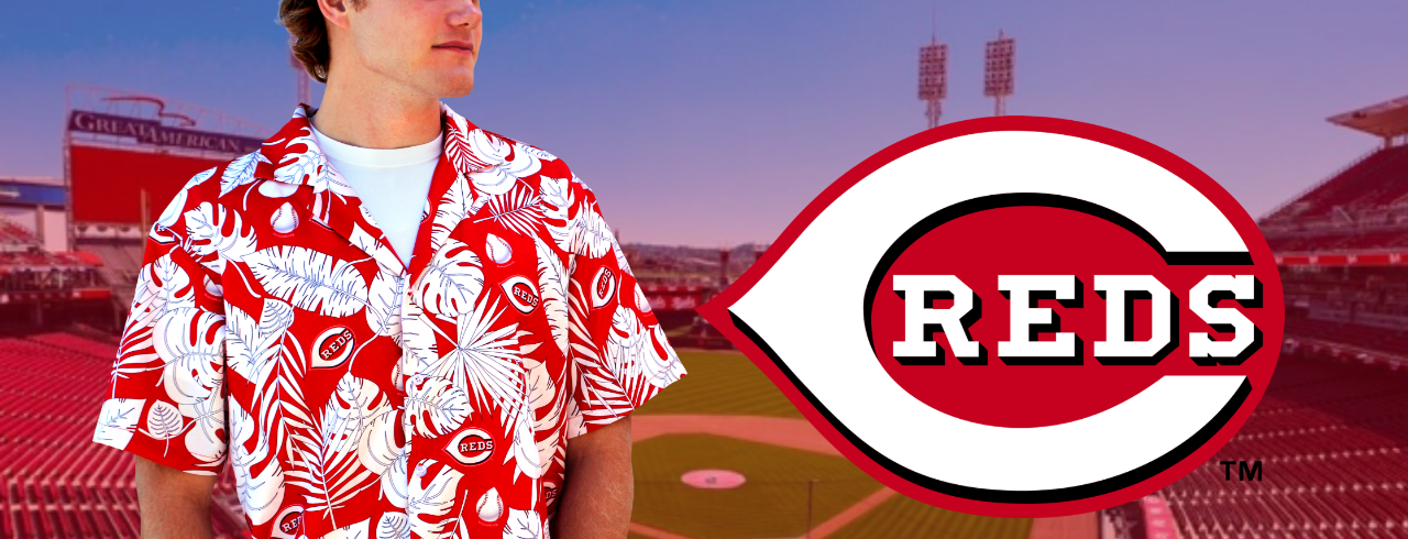 A person wearing a Cincinnati Reds shirt next to the Reds logo in front of a photo of Great American Ball Park