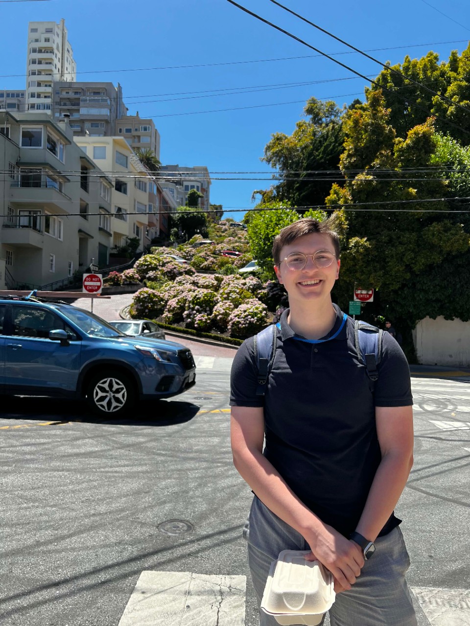 Daniel Vennemeyer stands at the base of Lombard Street in San Francisco.