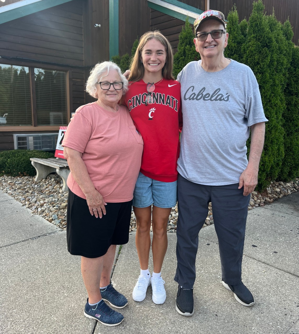 Juliette Laracuente-Huebner poses with her grandparents