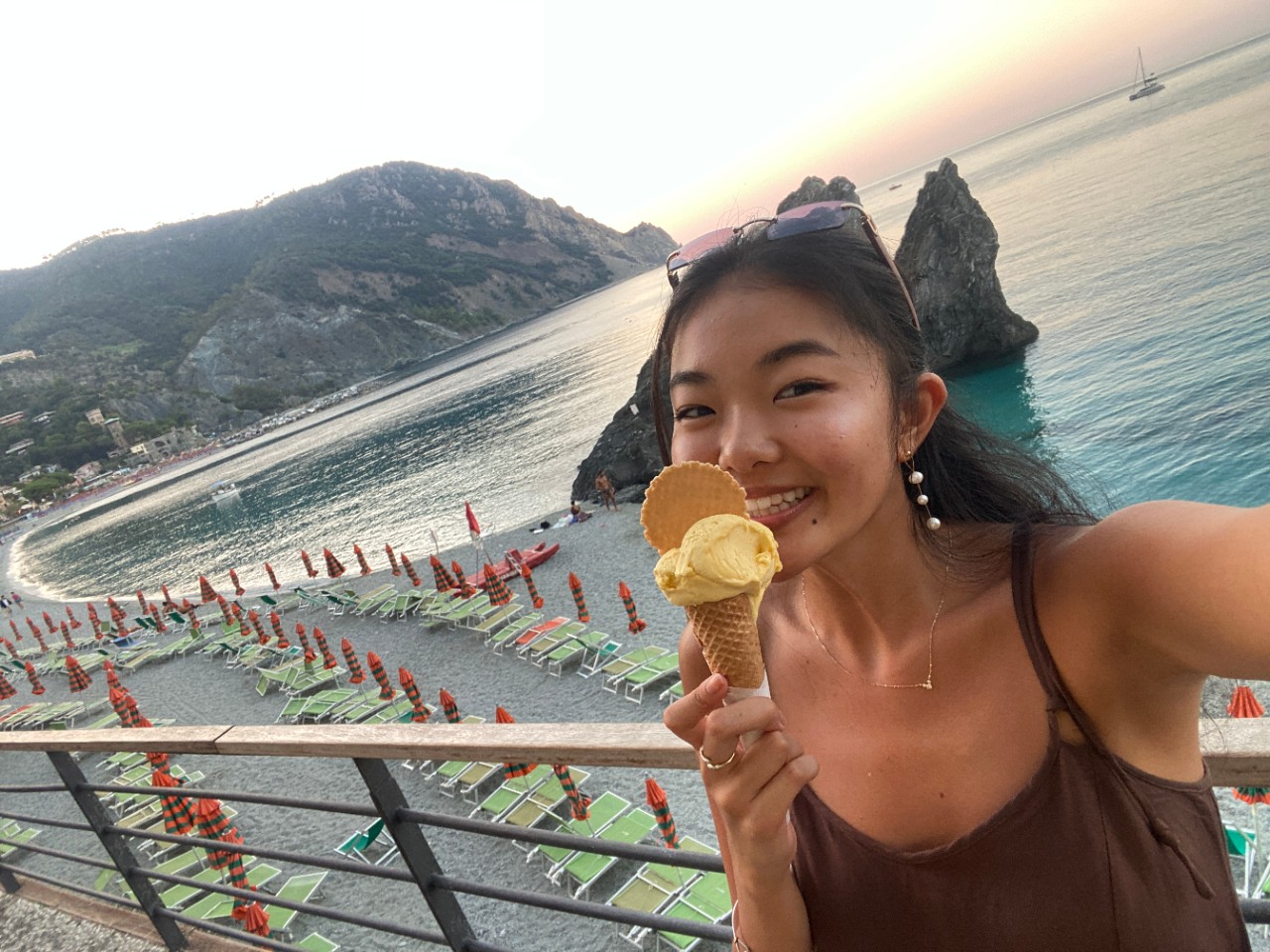 UC student Saki Nakamura smiles with a gelato cone in Italy.