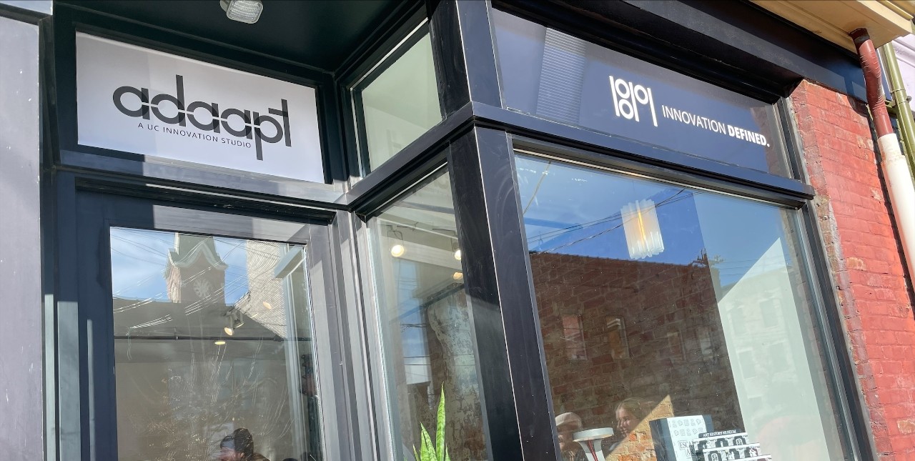 Photo of ADAAPT logo on the storefront.