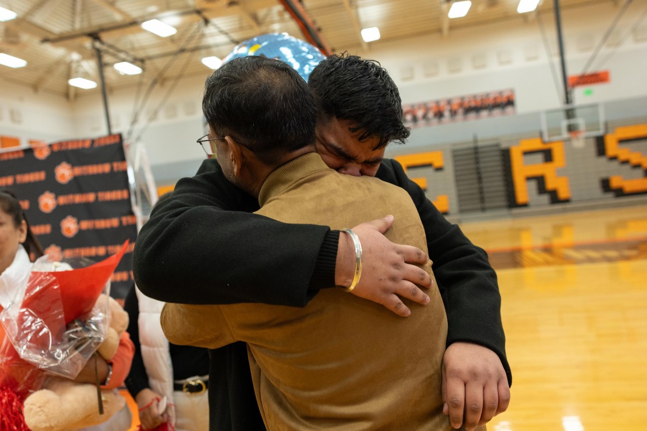 UC celebrates Decision Day 2025 student surprises. Withrow High School, Oliver Tiani Vessah and Harsh Minhas (Marian Spencer Scholars).
