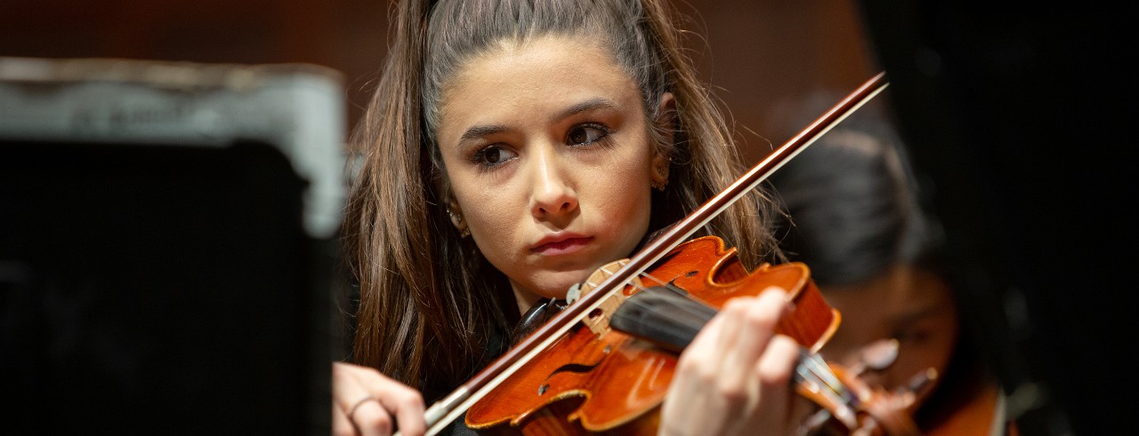 CCM Philharmona performs on stage