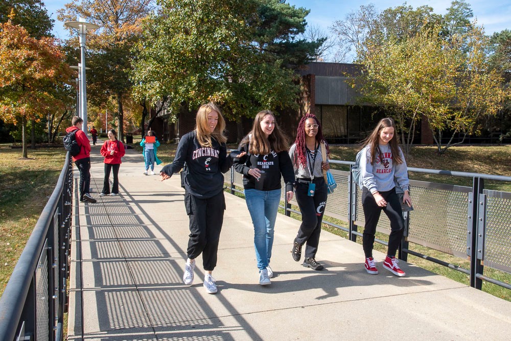 Students walking outside in babies