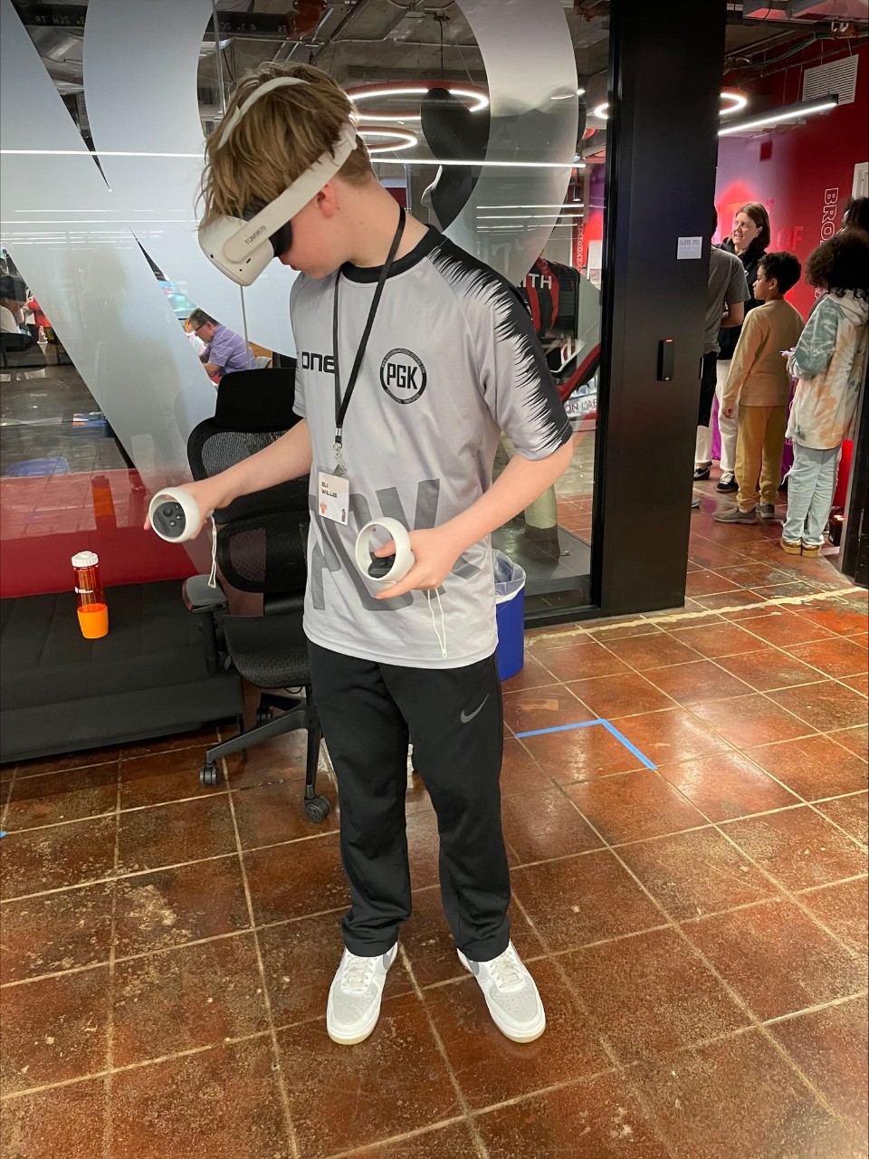 High school student explores different job roles wearing a virtual reality headset.