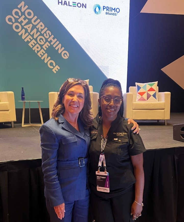 Knott and Colleen Lindholz, President of Kroger Health, at the 2025 Nourishing Change Conference 