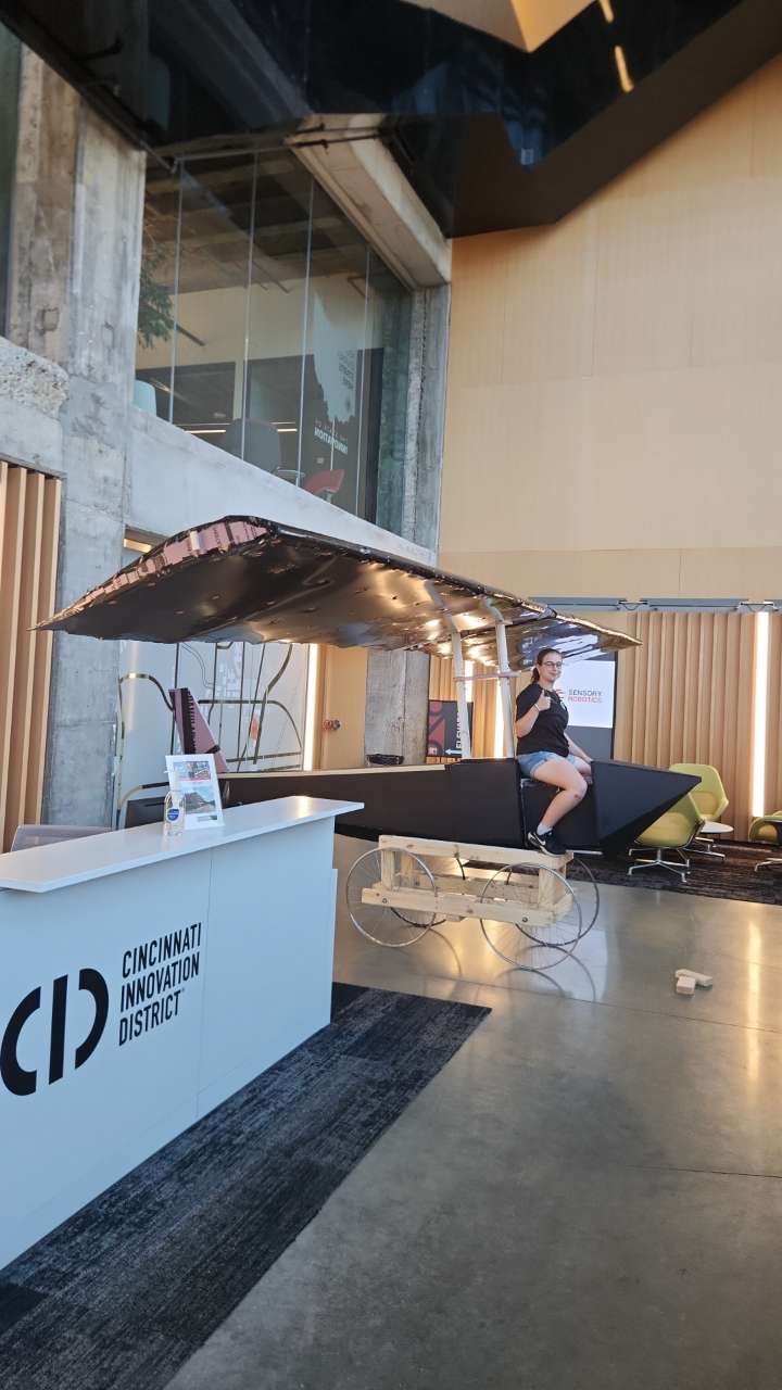 Student sits on the aircraft before the competition.
