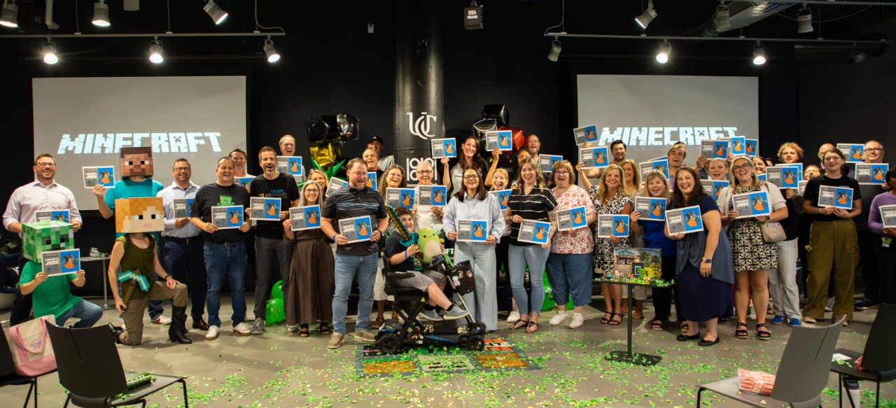 Group shot of Microsoft team members and Jude. 