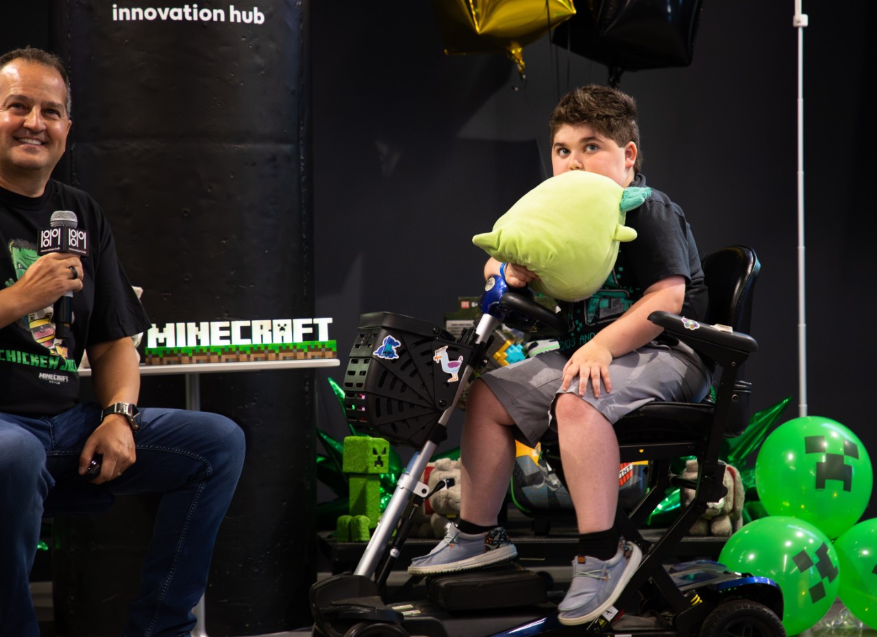 Chris Carper sits with Jude before the big news is revealed.