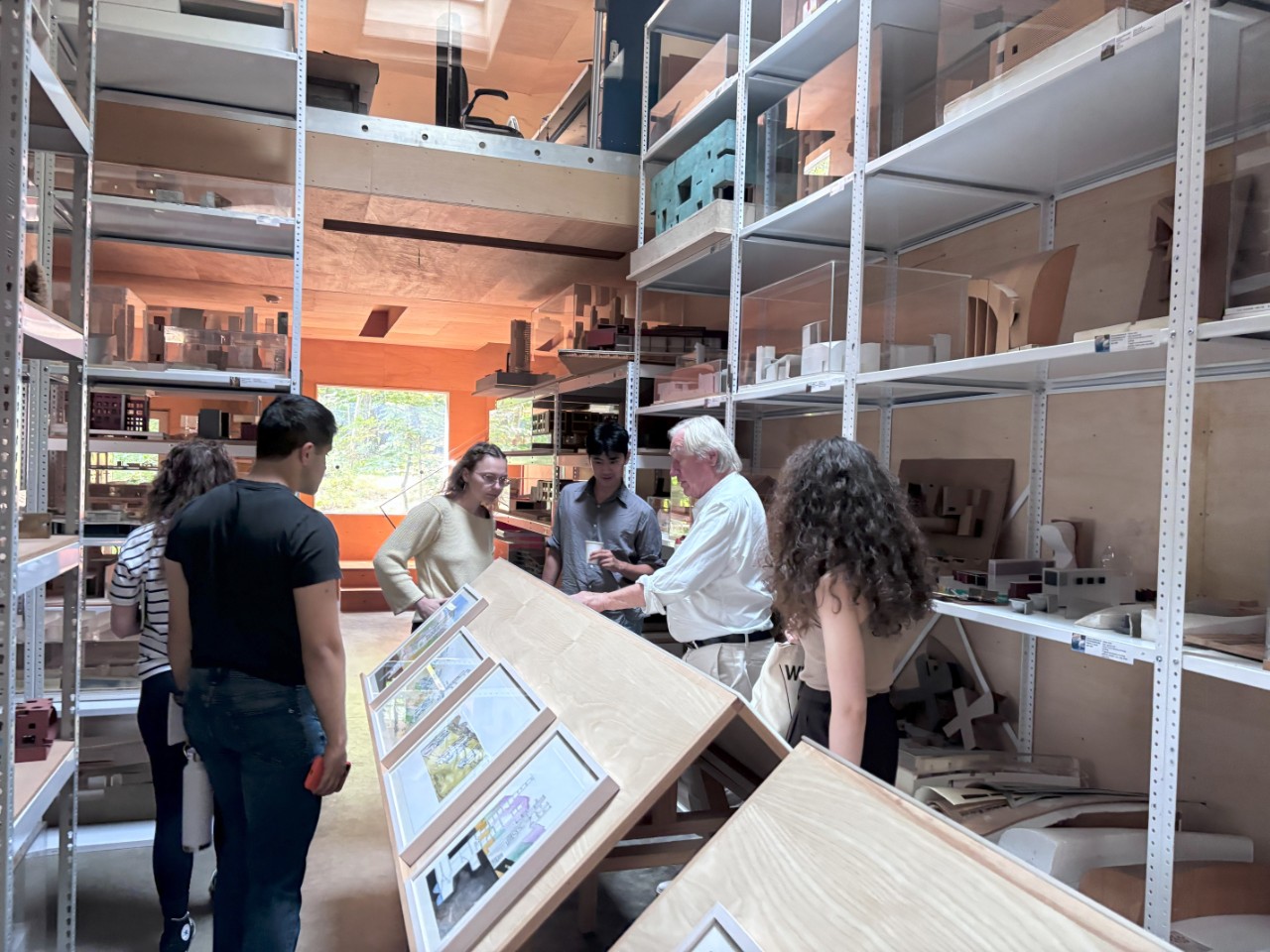 Holl and students in the NYC studio with models and art
