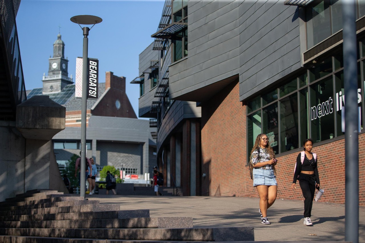 Students walking through UC's campus in the first day of college