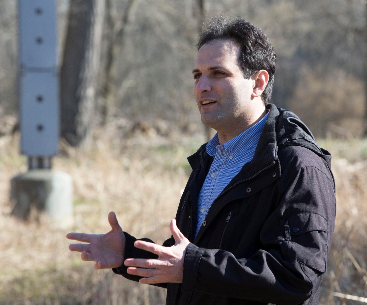 UC professor Reza Soltanian gestured as he spoke about his research at Groundwater Observatory at Miami Whitewater Forest. UC/Joseph Fuqua II