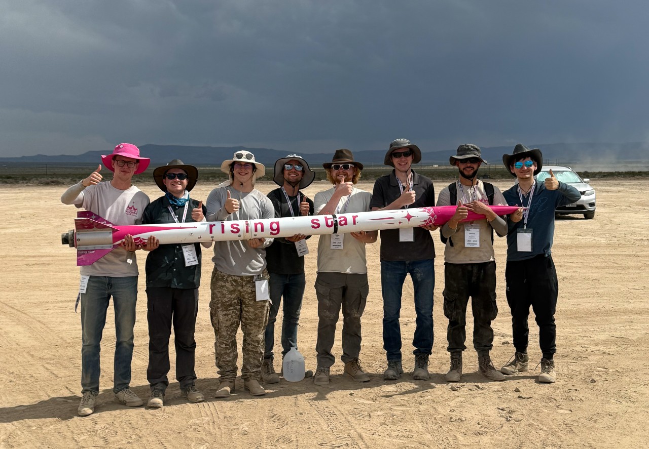Students pose with their rocket in Midland, Texas.