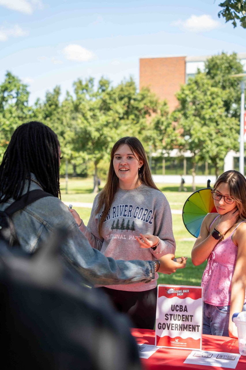 students talking outside on the UC Blue Ash campus