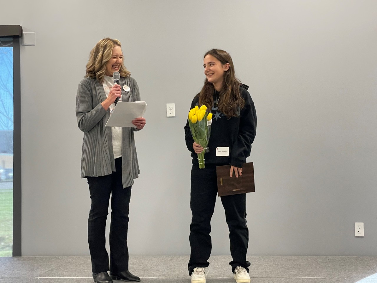 Maria Agnello, right, a previous Fluency Friday Irv Wollman Do the Right Thing Award recipient