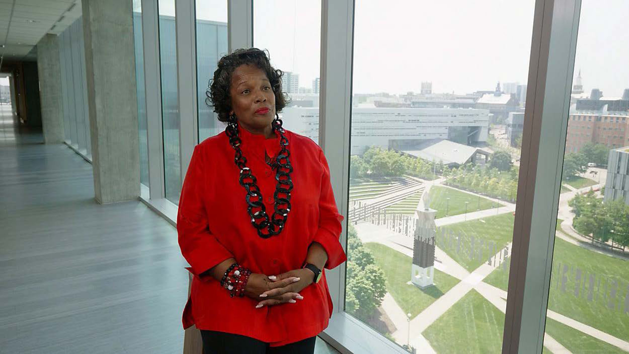 Alisha Fowler with the UC campus as a backdrop 