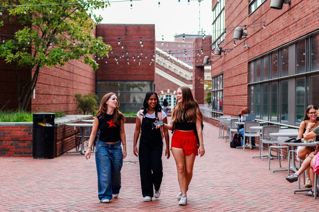 UC students walking on campus together