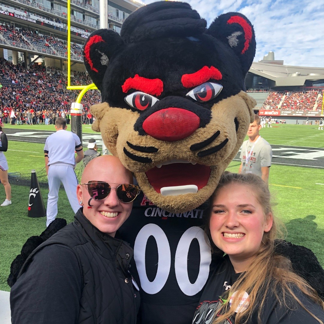 Maddie Bell with the Bearcat in Nippert Stadium at a UC football game